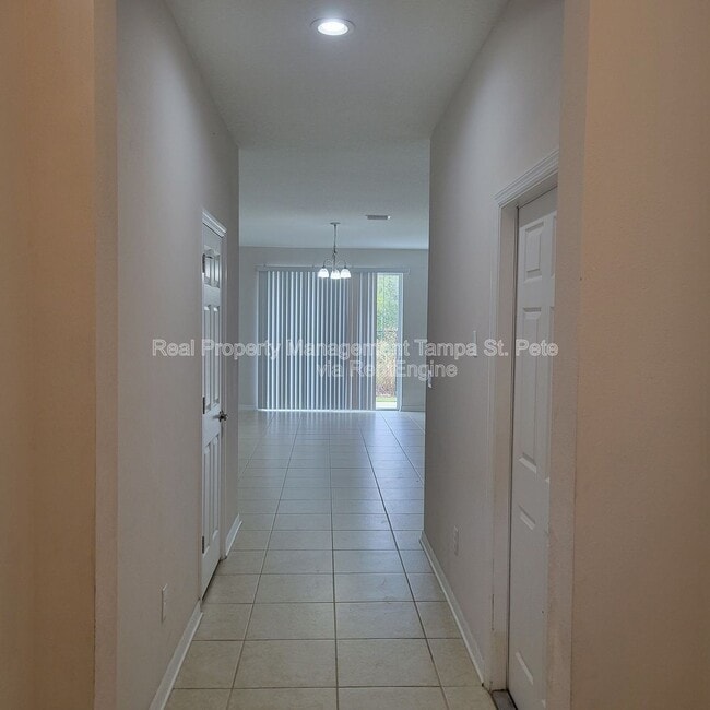 Photo - 6409 Tillandsia Pl