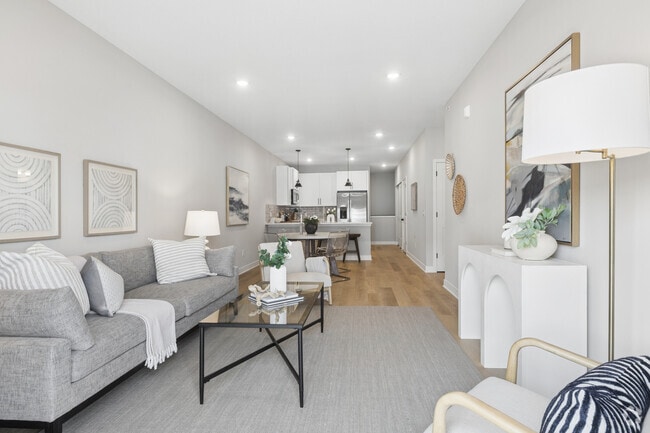 3BR, 2BA - 1,450SF - Living Room - Oneka Fields Townhomes