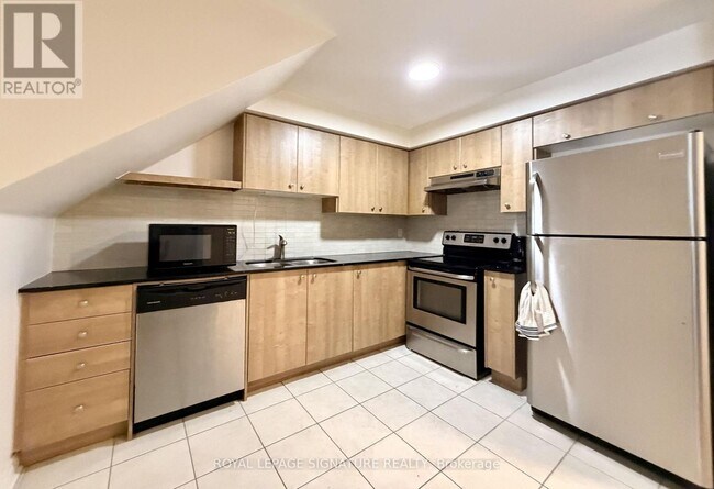 Photo - 6063 Kingston Rd Unité 7