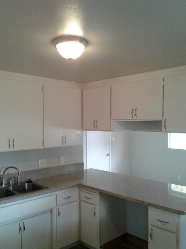 Photo - STOP BY, PEEK THROUGH THE WINDOWS AND EXPLORE THE AREA!