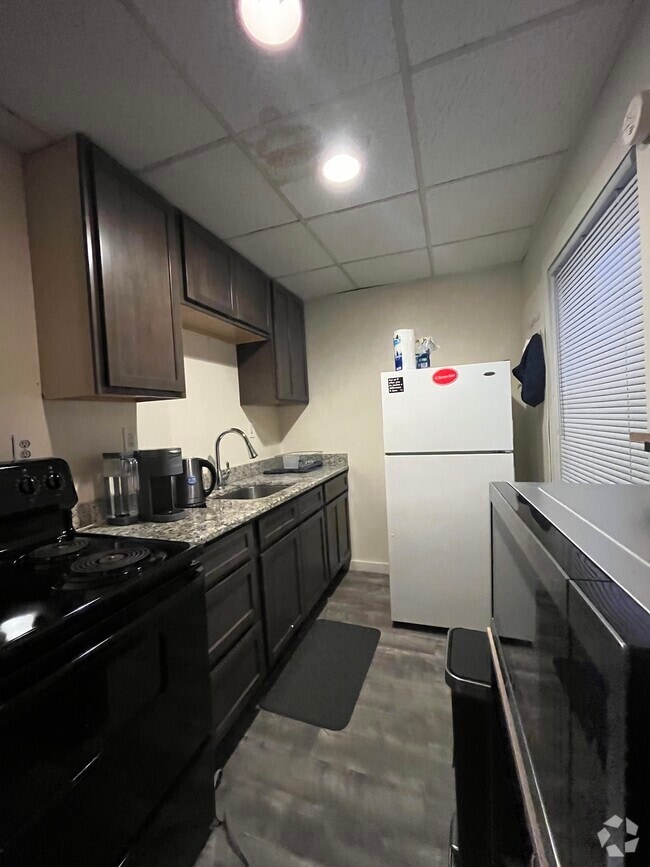 Building Photo - 1709 Tibbits Ave Unit RPI off campushouing Rental