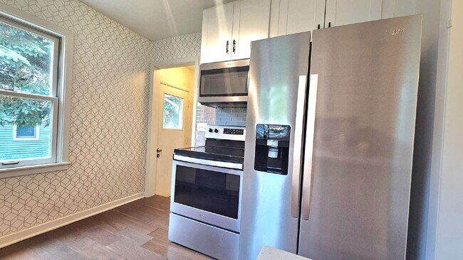 Photo - Beautiful 3-Bed, 3-Bath Haven with 1,901 Sq Ft of Comfort in St Louis Park with yard. 7/1/2026
