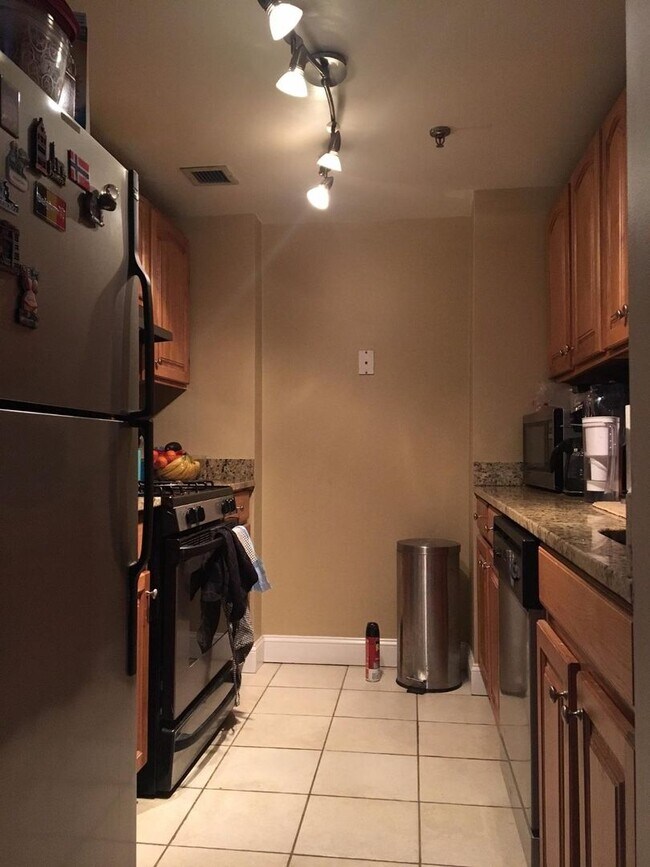 Photo - Spacious Top-Floor 2-Bedroom with Heat Included & Garage Parking!