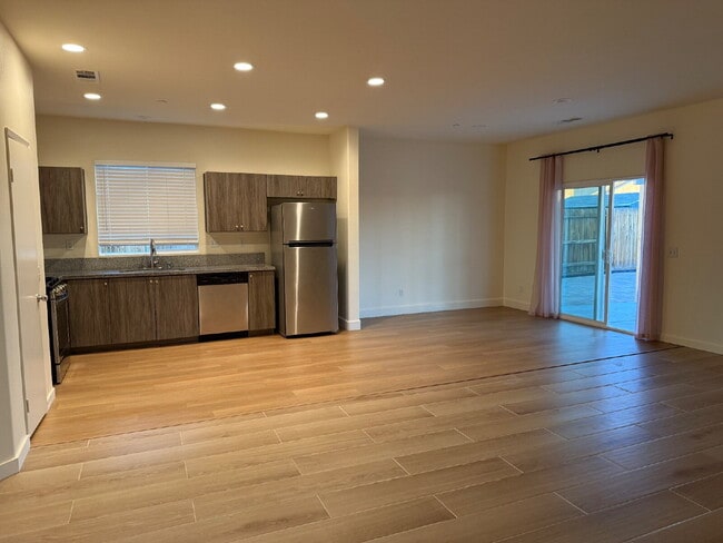 Photo - Solor Savings!  Beautiful modern interior with open floorplan for entertaining.  Large backyard w...