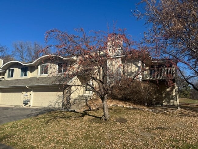 Photo - Beautifully Updated 3 Bed, 2 Bath, 2 Car Garage End Unit Townhome with Vaulted Ceilings