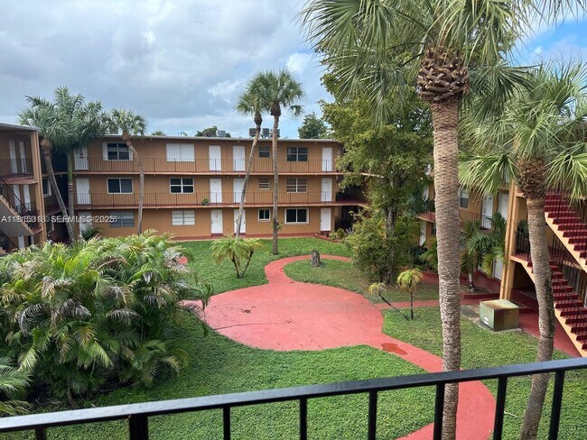 Building Photo - 1230 W 54th St Unit 325A