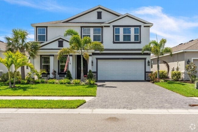 Building Photo - Spacious 5-Bedroom Home with Resort-Style ...