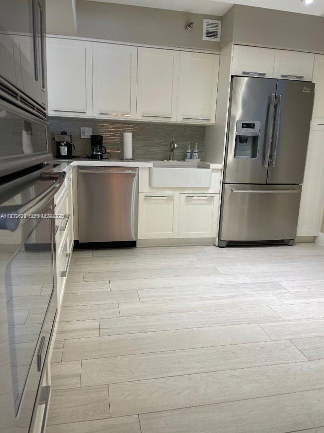 Photo - 3500 Mystic Pointe Dr Unit 1507