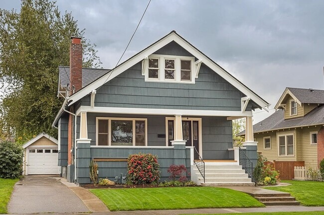 Building Photo - 4 BD Classic Craftsmanship Meets Modern Co...