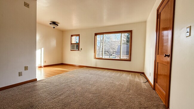Living room with dining - Brentwood Apartments