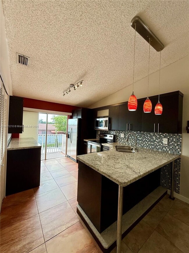 Building Photo - 6843 W 36th Ave Unit 204 Rental