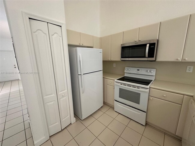 Photo - 1568 SE 26th St Unidad 200