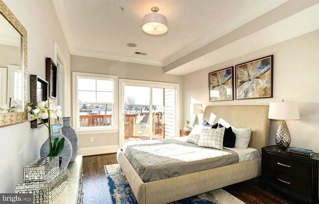 Photo - Top Floor, 2BR, 2BA with Den + Private Large Rooftop and Garage parking! A Must see!!