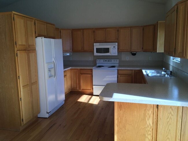 Photo - 4 BEDROOM, 3 BATHROOM HOUSE WITH 2 CAR ATTACHED GARAGE
