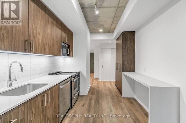 Photo - 115 Larchmount Ave Unité 301