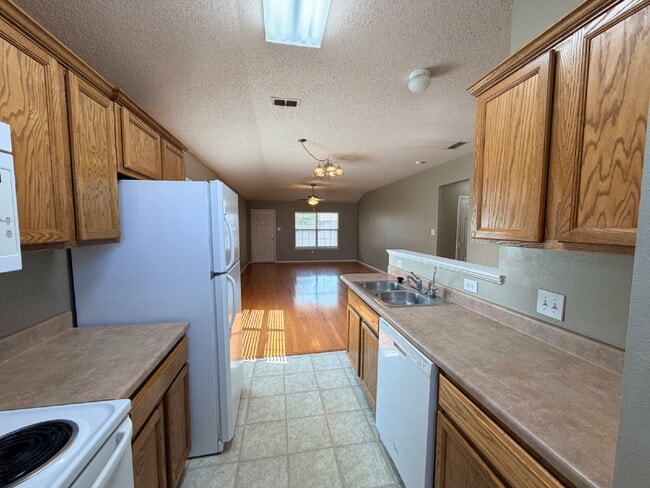 Photo - "Charming 3-Bed, 2-Bath Home in Lubbock's Serene Neighborhood – 1,315 Sq Ft of Comfortable Living!"