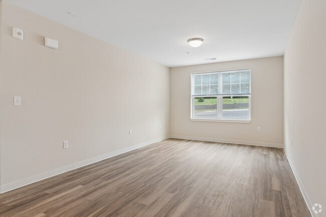 3BR, 1.5BA - 1,061SF - Living Room