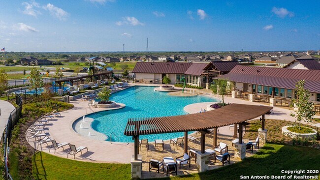 Photo - 2 Week Free Move-In Special!Spacious 4 Bed / 2.5 Bath Home – 2,243 Sq Ft + Resort-Style Amenities