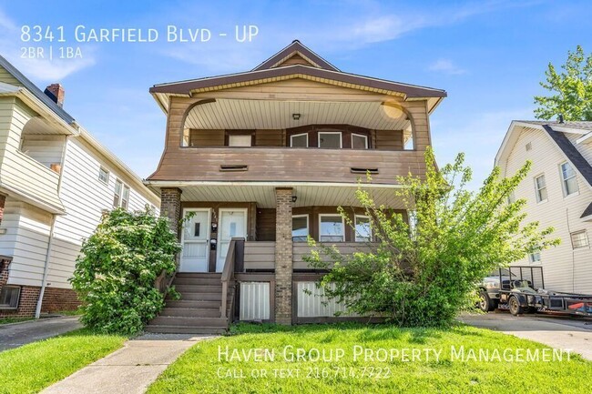 Building Photo - 8341 Garfield Blvd Unit UP