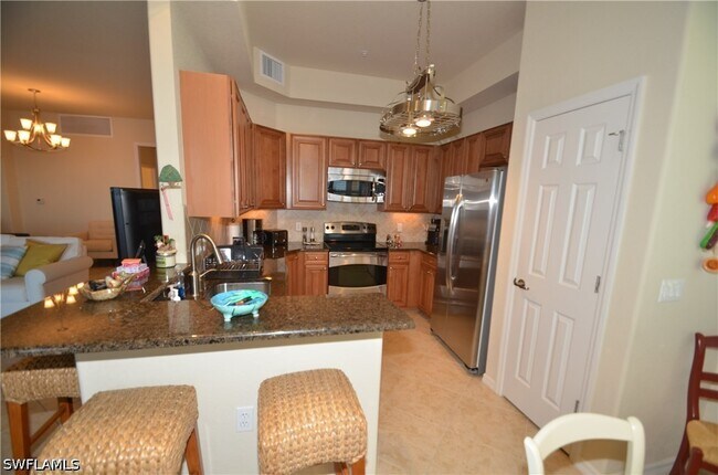 Building Photo - 10572 Smoke House Bay Dr Unit 101