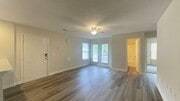 3Bed Patio Living Room- New LVT Flooring, Refinished Countertops, Keyless Smart Locks, Smart Thermostats and more.