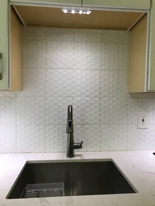 Kitchen sink is large and has a garbage disposal - 7350 N Pima Rd Unit 165