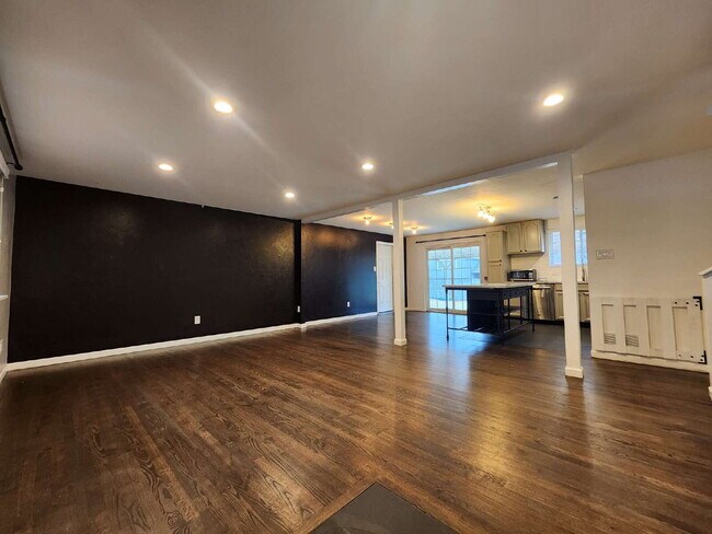 Photo - Spacious 5 Bed Home with Finished Basement, Multiple Living Areas & Private Backyard