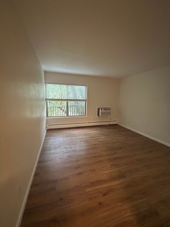 Living Room and AC - 2707 Valmont Rd Unit Two Mile Creek Conds