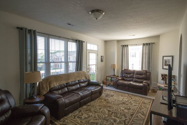 Photo - End Unit Townhouse With Garage and Unfinis...