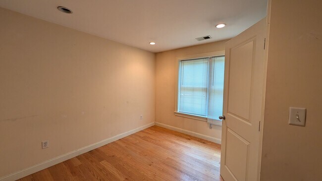 Photo - Spacious Townhouse: 4-bed, 3.5 bath unit in Brighton with Garage Parking