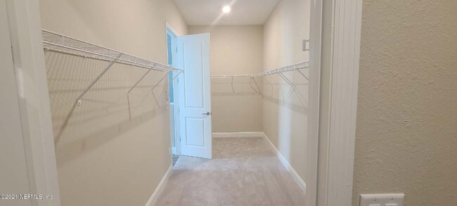 Photo - 4 bedroom home with 3 car garage In gated community