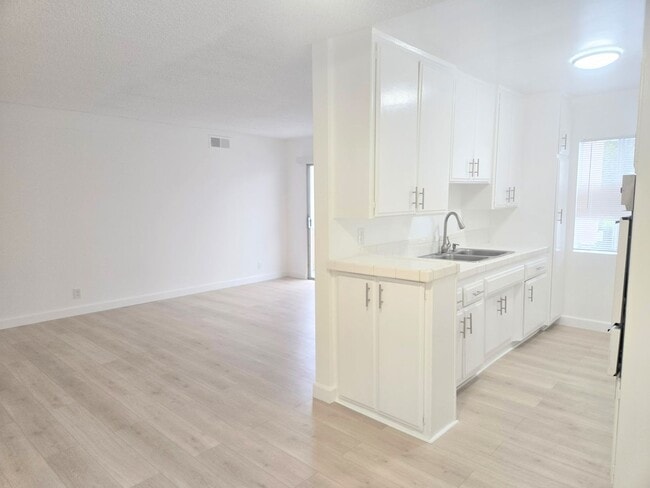 Photo - Welcome home! 2bd/2ba unit with parking. Master bedroom with en-suite bathroom! Unit #6