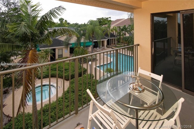 Building Photo - 9999 Summerbreeze Dr Unit 403