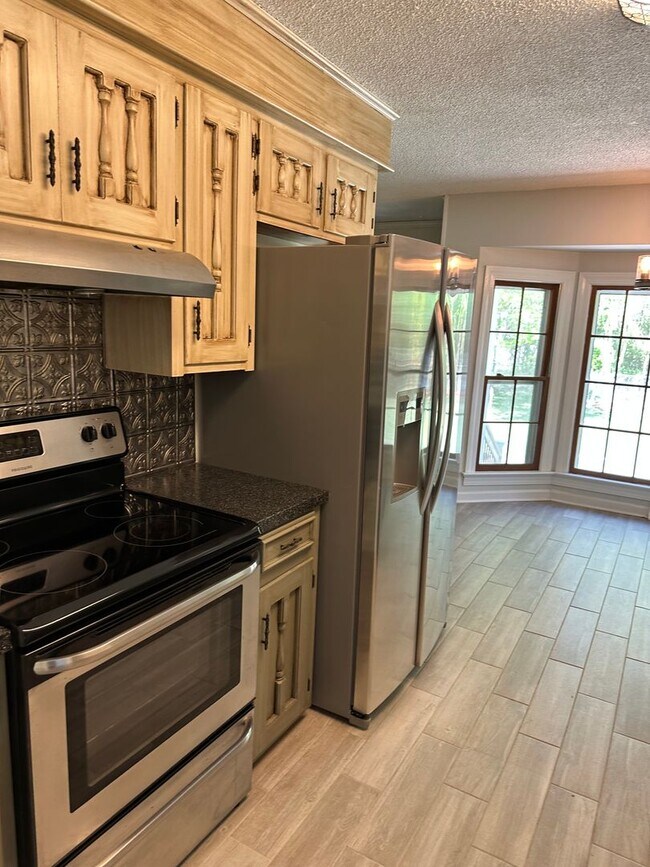 Photo - Beautiful 4 Bedroom 2 baths 2 car garage