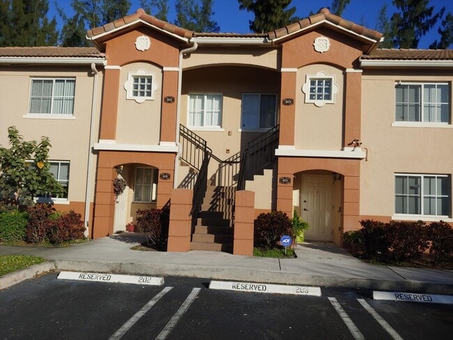 Building Photo - 3760 N Jog Rd Unit 202