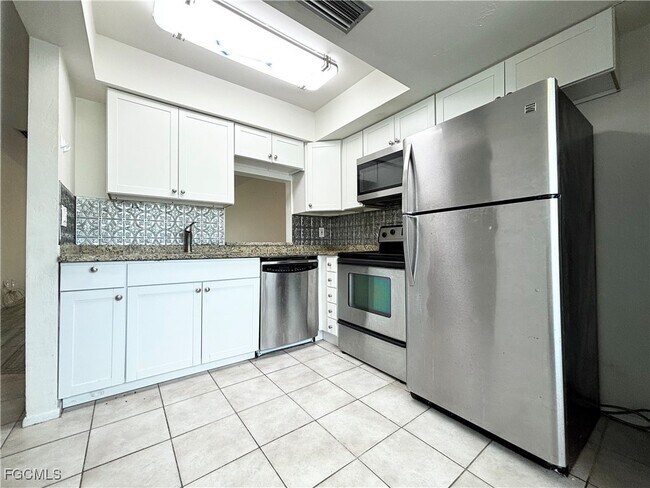 Building Photo - 4619 SE 5th Pl Unit 1 Rental