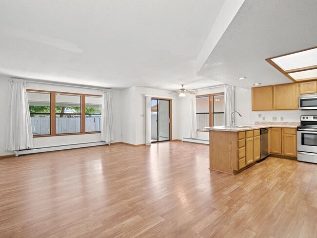 Photo - Spacious 2BR Rental with Open Floor Plan & Low-Maintenance yard