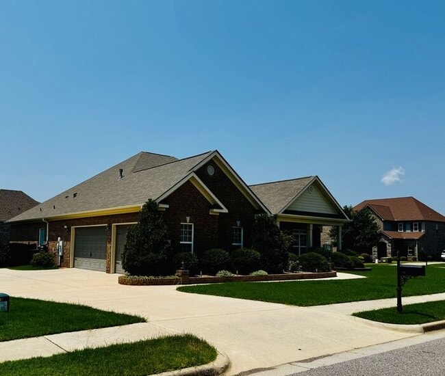 Photo - Madison City Schools with a 3 car garage and large fenced yard!