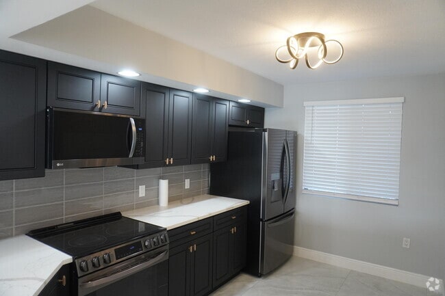 Building Photo - 2811 Village Blvd Unit 201 Rental