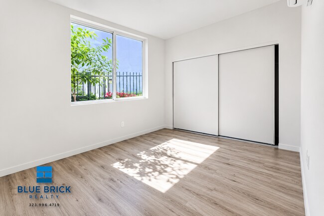 Building Photo - 10501 Wilmington Ave Unit 108