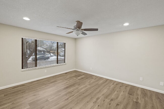 Photo - Spacious Split-Level Home with Finished Basement, Deck, Fenced Yard & 2-Car Garage