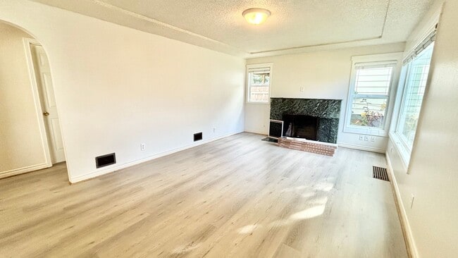 Photo - Recently Renovated House With Fenced Back Yard, Attached Garage, and Basement