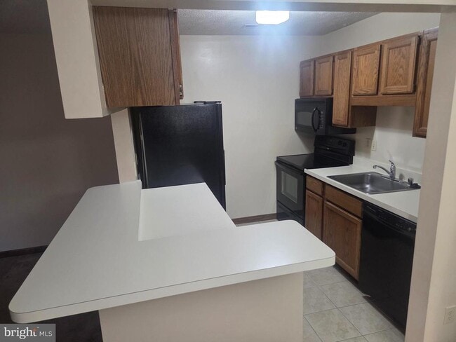 Building Photo - 23239 Rosewood Ct Unit A-8