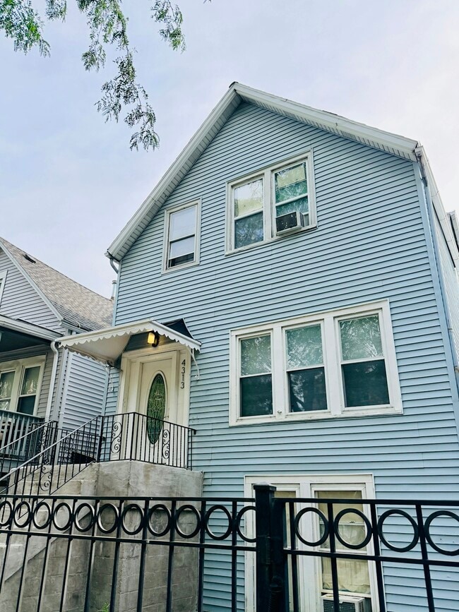 Building Photo - 4313 N Bernard St Unit 2