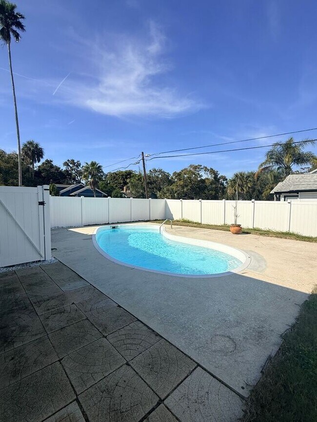 Photo - Stunning 2BR 2BA SFR w/ Private Pool • 2-Car Garage in Clearwater