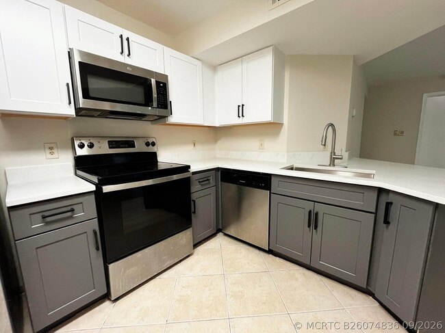 Photo - 8701 Wiles Rd Unit 204