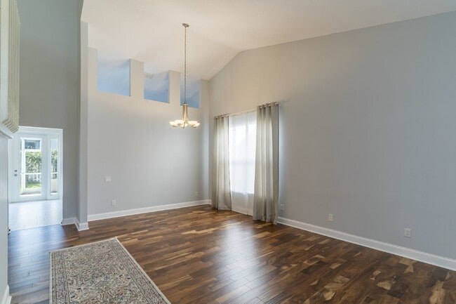 Photo - Beautiful 4/2 home Located on a tree lined street in the gate of country club community of the Hu...