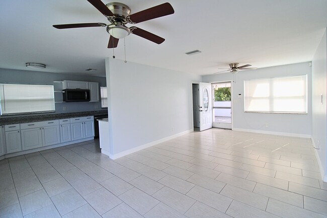 Photo - 3-Bed, 2-Bath Home with Spacious Fenced Ya...