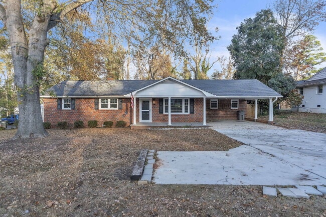 Building Photo - Stylishly Updated 3BR/1.5BA Residence with Exclusive Fenced Outdoor Space & Outbuilding