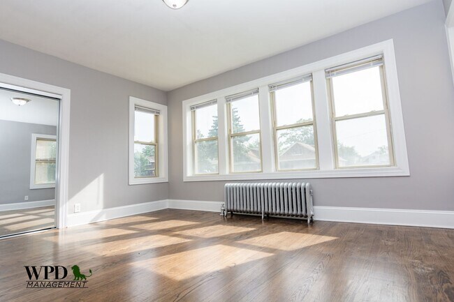 Building Photo - 7552 S Carpenter St Unit 2